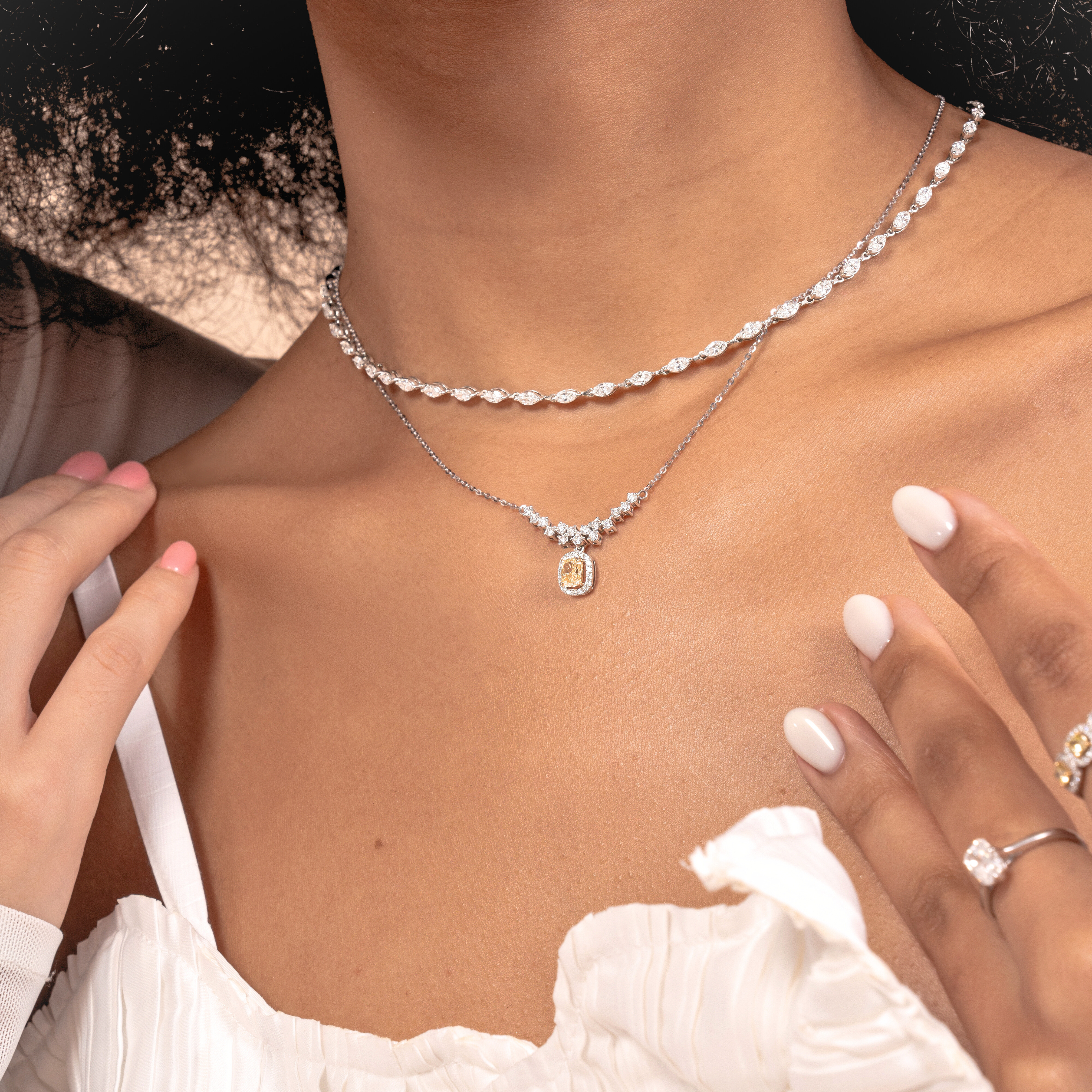 Discover the timeless brilliance of a Diamond necklace and pendants.