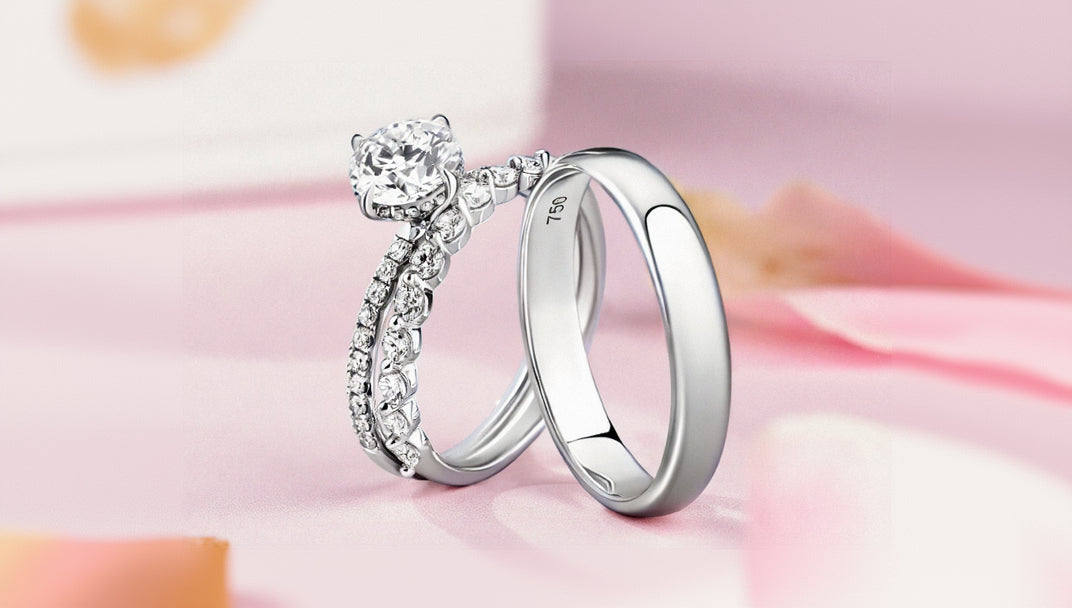 Two Diamond rings with white gold diamond Pave on a soft pink background